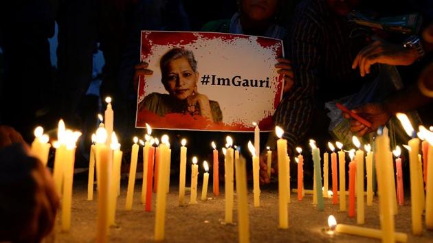 Activists take part in a protest rally against the killing Gauri Lankesh at the India Gate memorial in New Delhi. (AFP File Photo) Activists take part in a protest rally against the killing Gauri Lankesh at the India Gate memorial in New Delhi. (AFP File Photo)