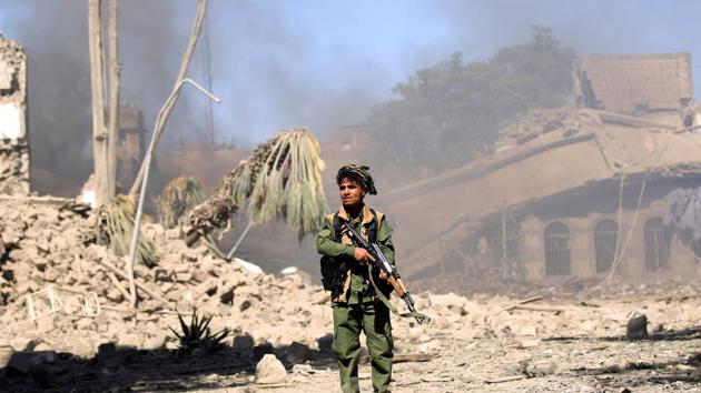 A Huthi rebel fighter inspects the damage after a reported air strike carried out by the Saudi-led coalition targeted the presidential palace in the Yemeni capital Sanaa on Tuesday. (AFP) A Huthi rebel fighter inspects the damage after a reported air strike carried out by the Saudi-led coalition targeted the presidential palace in the Yemeni capital Sanaa on Tuesday. (AFP)