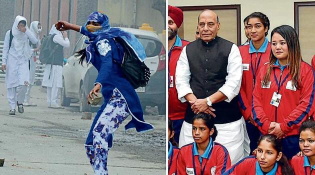 Afshan Ashiq, who had pelted stones during a protest in the Valley, stands to the left of Union home minister Rajnath Singh in New Delhi on Tuesday.(PTI photo)