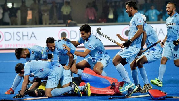 Indian hockey team players celebrate with goalkeeper Chikte Akash after beating Belgium in sudden death shootout to enter the semifinals of the FIH Hockey World League Final (HWLF) at Kalinga Stadium in Bhubaneswar on Wednesday. (PTI) Indian hockey team players celebrate with goalkeeper Chikte Akash after beating Belgium in sudden death shootout to enter the semifinals of the FIH Hockey World League Final (HWLF) at Kalinga Stadium in Bhubaneswar on Wednesday. (PTI)