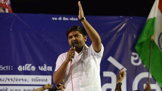 Hardik Patel addressing a gathering with his supporters during 'Adhikar Sammelan' at Mansa, some 50 km from Ahmedabad. (AFP Photo) Hardik Patel addressing a gathering with his supporters during 'Adhikar Sammelan' at Mansa, some 50 km from Ahmedabad. (AFP Photo)