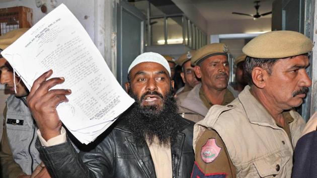 Police take away one of the eight members of Lashkar-e-Taiba (LeT), who were awarded life imprisonment by a local court in Jaipur on Wednesday (PTI Photo) Police take away one of the eight members of Lashkar-e-Taiba (LeT), who were awarded life imprisonment by a local court in Jaipur on Wednesday (PTI Photo)