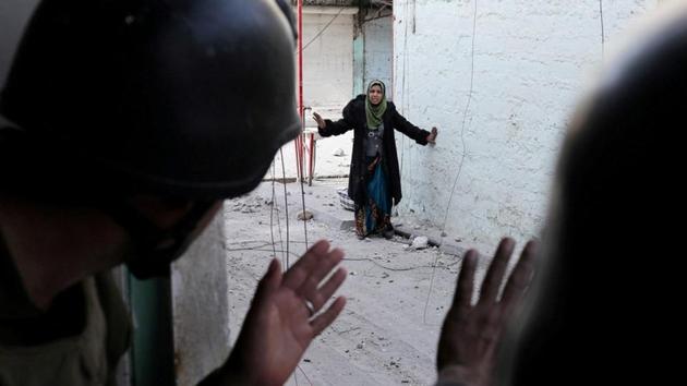A woman gestures approaching Iraqi Special Forces during a battle in Mosul in March 2017. Even with supportive US air strikes, Baghdad’s triumph came at a devastating cost for the once-vibrant, multicultural cities in northern Iraq and surrounding regions. When ISIS first arrived in Mosul in June 2014, sweeping aside crumbling Iraqi army units, many residents welcomed them disgruntled by then-Shi’ite PM Nuri al-Maliki’s widespread sectarian abuses. (Goran Tomasevic / REUTERS)
