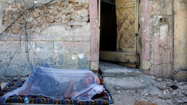 An Iraqi Federal Policeman rests in the Old City of Mosul. In the weeks before Raqqa’s fall in October, SDF fighters faced off against hardened militants and suffered losses. But that did not curb their enthusiasm and some said they would eventually join Kurdish PKK militants in Turkey and help advance their 33-year-old insurgency there. (Ahmed Jadallah / REUTERS)