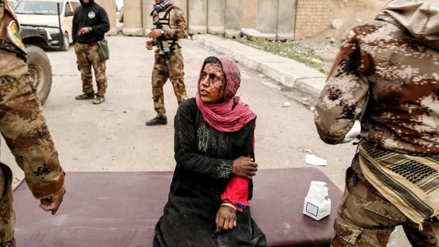 A woman injured in a mortar attack is treated by medics as Iraqi forces battle with Islamic State militants, in western Mosul. The victors in Iraq and Syria now face new challenges as they rebuild cities shattered by the showdowns. Kurdish groups who led the fight against ISIS in its former bastions now navigate a complex peace to avoid ethnic tension with Arab majorities. Meanwhile, life for the liberated residents remains fraught with risk. (Zohra Bensemra / REUTERS)