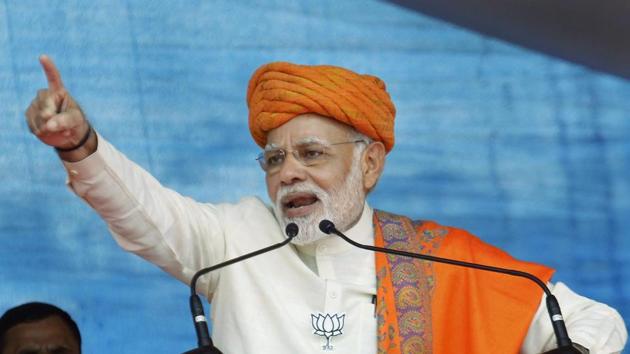 PM Narendra Modi addresses an election rally at Dhandhuka village of Ahmedabad district on Wednesday. (PTI Photo) PM Narendra Modi addresses an election rally at Dhandhuka village of Ahmedabad district on Wednesday. (PTI Photo)