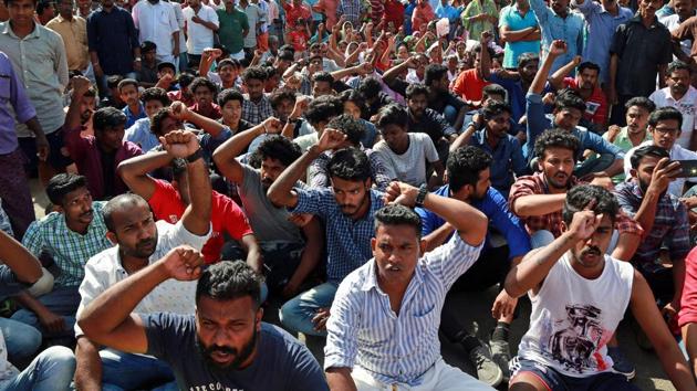 Residents block a road during a protest demanding the government to reconstruct damaged sea walls and provide rehabilitation for those staying near the seashore after flooding caused by Cyclone Ockhi, in the coastal village of Chellanam, in Kerala. (Reuters Photo) Residents block a road during a protest demanding the government to reconstruct damaged sea walls and provide rehabilitation for those staying near the seashore after flooding caused by Cyclone Ockhi, in the coastal village of Chellanam, in Kerala. (Reuters Photo)