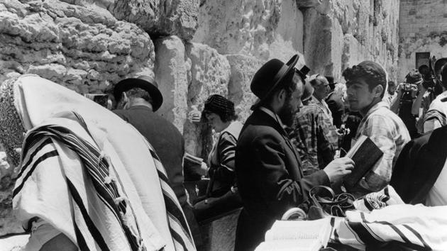 Jewish people at the Wailing Wall for the first time after its capture during the Six Day War in 1967. Israel claims all of Jerusalem as its capital, while the Palestinians claim the eastern sector, captured by Israel in 1967, as the capital of a future independent state. These rival claims lie at the heart of the decades-long conflict. While Israel controls the city and its government is based there, its annexation of east Jerusalem is not internationally recognized. (Terry Fincher / Getty Images) 