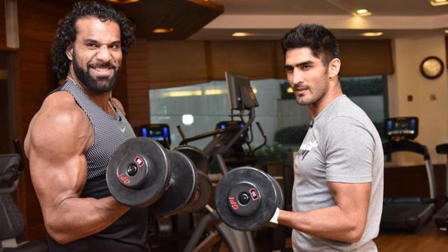 WWE superstar Jinder Mahal trains with boxer Vijender Singh in New Delhi. (WWE) WWE superstar Jinder Mahal trains with boxer Vijender Singh in New Delhi. (WWE)