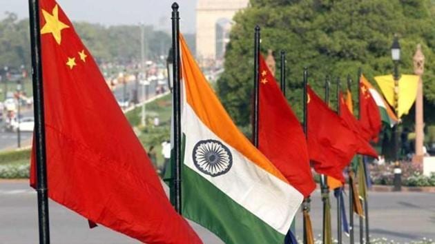 A file photo of the national flags of China and India at Vijay Chowk in New Delhi.(HT Photo)