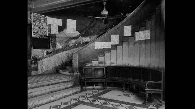 Untitled #16 (Prabhat), 2009. Inkjet Print. Raman’s photographs are intricately detailed, almost an anthropological study of life inside desolate cinemas. Each element weaves its own story within the larger frame, revealing something personal about the space and its dwellings. It observes the passage of time in society, manifested through simple changes inside the cinemas. (Courtesy Nandita Raman and sepiaEYE)