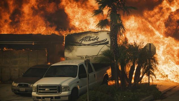 Flames consume a home on Via Arroyo as a wildfire rages in Ventura. Authorities issued a “purple” alert --never used before-- because of the extreme danger including winds that could reach 128 kilometers an hour, severely limiting containment efforts. (Noah Berger / AP) Flames consume a home on Via Arroyo as a wildfire rages in Ventura. Authorities issued a “purple” alert --never used before-- because of the extreme danger including winds that could reach 128 kilometers an hour, severely limiting containment efforts. (Noah Berger / AP)