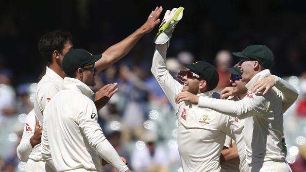 Australian players celebrate at the end of the second Ashes Test in Adelaide. (AP) Australian players celebrate at the end of the second Ashes Test in Adelaide. (AP)