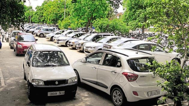 A packed parking lot in Sector 17, Chandigarh.(HT Photo)