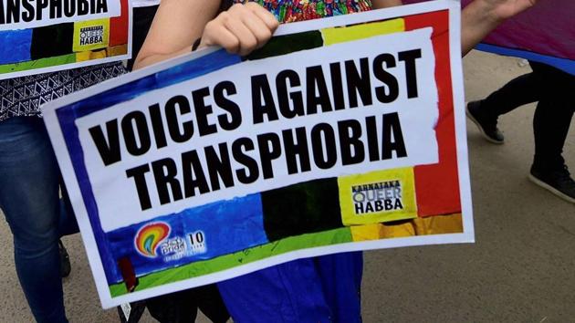 A LGBTQ supporter holds a placard at a rally.(PTI File Photo)