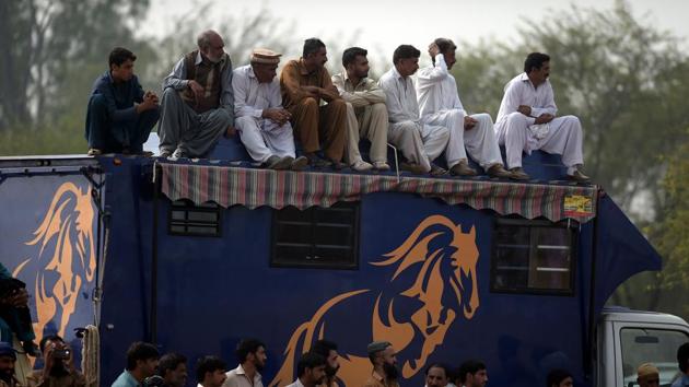 But in northern Punjab’s Kot Fateh Khan, fans showed up in droves to cheer on the brazen riders, decked out in pristine white tunics and multi-coloured waistcoats on freshly polished saddles. (Aamir Qureshi / AFP) But in northern Punjab’s Kot Fateh Khan, fans showed up in droves to cheer on the brazen riders, decked out in pristine white tunics and multi-coloured waistcoats on freshly polished saddles. (Aamir Qureshi / AFP)