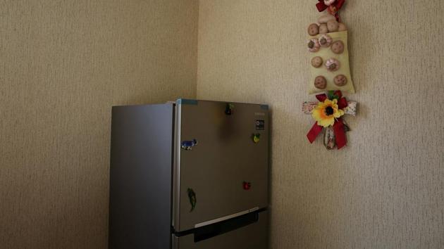 The child’s body remained in the freezer of the family refrigerator. On the door the Peruvian woman placed a sign that says Do Not Touch. (Reuters Photo) The child’s body remained in the freezer of the family refrigerator. On the door the Peruvian woman placed a sign that says Do Not Touch. (Reuters Photo)
