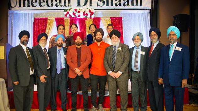 The Sikh Human Development Foundation team with Gurpreet Ghuggi (in red turban) at the fundraising gala.(Facebook) The Sikh Human Development Foundation team with Gurpreet Ghuggi (in red turban) at the fundraising gala.(Facebook)