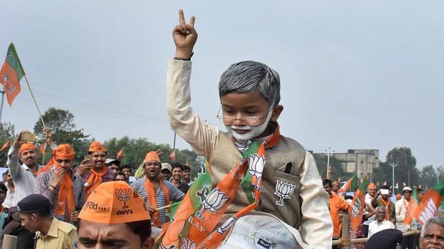 A child dressed as Prime Minister Narendra Modi at the PM’s ‘Gujarat Vikas Rally’ in Surat.(PTI File Photo)