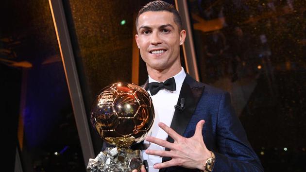 Cristiano Ronaldo celebrates after winning his fifth Ballon d’Or award.(AFP)