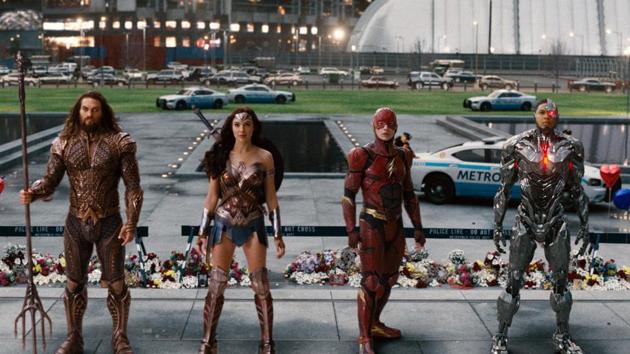 This image released by Warner Bros. Pictures shows Jason Momoa, from left, Gal Gadot, Ezra Miller and Ray Fisher in a scene from Justice League. (AP) This image released by Warner Bros. Pictures shows Jason Momoa, from left, Gal Gadot, Ezra Miller and Ray Fisher in a scene from Justice League. (AP)