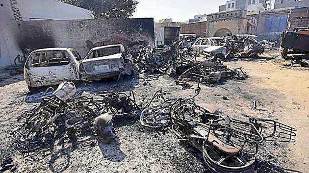 Vehicles torched at a Jhajjar police station during the Jat stir. (HT File) Vehicles torched at a Jhajjar police station during the Jat stir. (HT File)