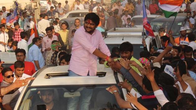 File photo of Patidar quota agitation leader Hardik Patel at a rally in Botad in October. The Patidar vote will be decisive in nearly 20 of the 89 assembly seats going to polls in the first phase on Saturday.(HT)