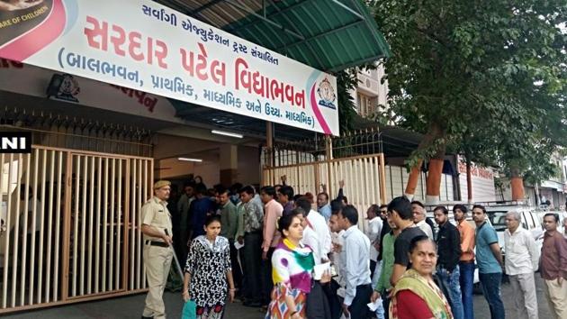 Faulty EVM in Sardar Patel Vidyalaya booth in Surat’s Varaccha has been replaced. (ANI Twitter) Faulty EVM in Sardar Patel Vidyalaya booth in Surat’s Varaccha has been replaced. (ANI Twitter)