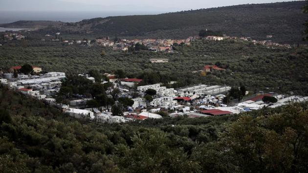 A general view shows the Moria camp for refugees on the island of Lesbos, Greece. Under the EU-Turkey deal, anyone crossing to Greece from Turkey (who does not qualify for asylum) must be deported. According to aid groups and experts on Europe’s migration crisis, the main problem behind this increase in migrations are a due to lack of political will to improve conditions on the Greek islands. (Alkis Konstantinidis / REUTERS) A general view shows the Moria camp for refugees on the island of Lesbos, Greece. Under the EU-Turkey deal, anyone crossing to Greece from Turkey (who does not qualify for asylum) must be deported. According to aid groups and experts on Europe’s migration crisis, the main problem behind this increase in migrations are a due to lack of political will to improve conditions on the Greek islands. (Alkis Konstantinidis / REUTERS)