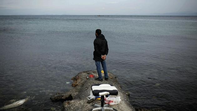 Syrian refugee Muhammad, 42, looks at the sea while fishing on the island of Lesbos, Greece. More than 8,500 asylum-seekers are stuck on Lesbos, where facilities for migrants were only designed to accommodate 3,000. A deal between the European Union and Turkey struck in 2016 stemmed the uncontrolled exodus of nearly a million people across the Aegean Sea. (Alkis Konstantinidis / REUTERS) Syrian refugee Muhammad, 42, looks at the sea while fishing on the island of Lesbos, Greece. More than 8,500 asylum-seekers are stuck on Lesbos, where facilities for migrants were only designed to accommodate 3,000. A deal between the European Union and Turkey struck in 2016 stemmed the uncontrolled exodus of nearly a million people across the Aegean Sea. (Alkis Konstantinidis / REUTERS)