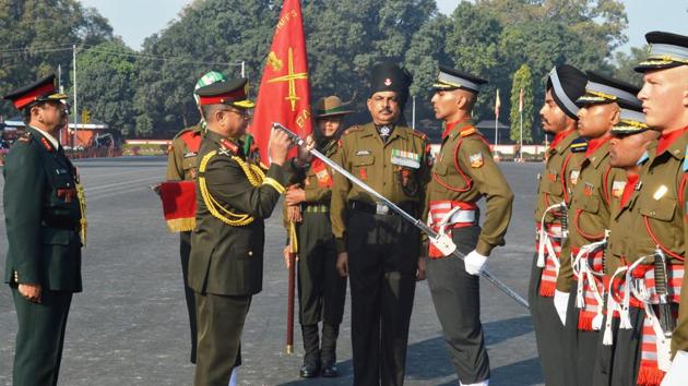 Chief of Army Staff of Bangladesh Abu Belal Muhammad Shafiul Huq presenting Sword of Honour to Chandrakant Acharya during Passing Out Parade at IMA in Dehradun.(Vinay Santosh Kumar/HT PHOTO)