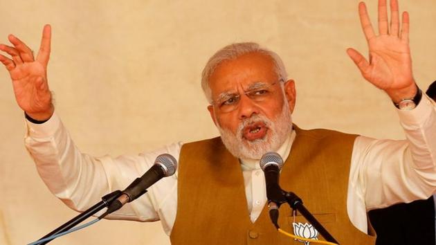 Prime Minister Narendra Modi at an election in Kalol on the outskirts of Ahmedabad on Friday. (Reuters Photo)