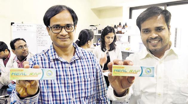 Milind Chaudhari (right) and Prasad Bhagat, founders of We lnnovate Bio Solutions, with their product, a wound healing cream for diabetic patients, in Pune.(Ravindra Joshi/HT PHOTO)