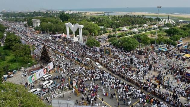 People throng in large number at the memorial of the late J Jayalalithaa to pay their respects on her first death anniversary, near shores of Marina in Chennai on Tuesday. (PTI) People throng in large number at the memorial of the late J Jayalalithaa to pay their respects on her first death anniversary, near shores of Marina in Chennai on Tuesday. (PTI)