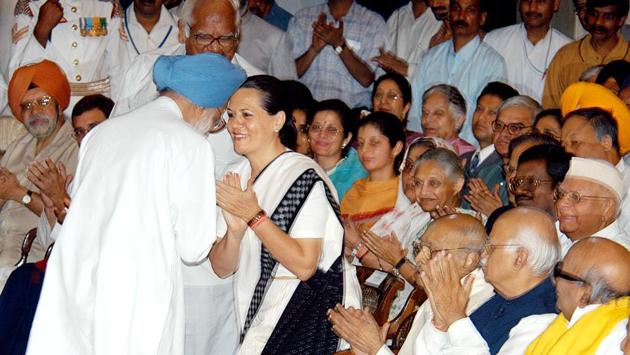 Former Prime Minister Manmohan Singh being greeted by Congress President Sonia Gandhi after the swearing-in ceremony at Rashtrapati Bhawan in New Delhi. (SN Sinha / HT ARCHIVE)