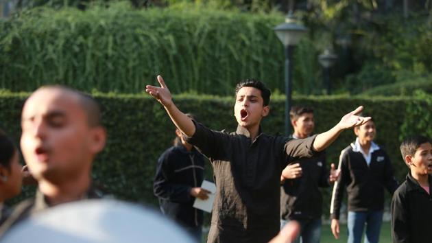 Youngsters perform a street play in the lawns of Australian High Commission, as part of 16 Days of Activism Against Gender-Based Violence Campaign.(Amal KS/HT Photo)