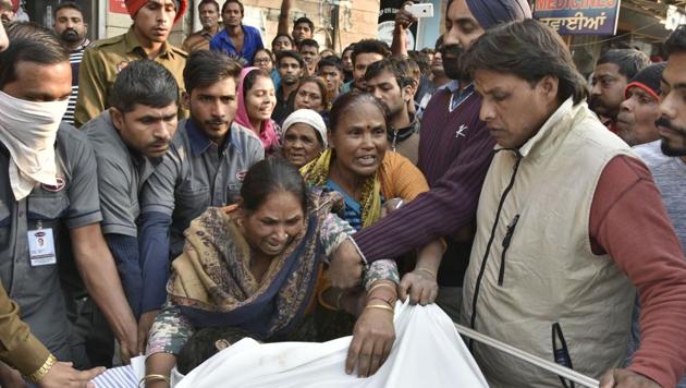 Family members of deceased Deepak outside the hospital in Ludhiana.(Gurpreet Singh/HT)