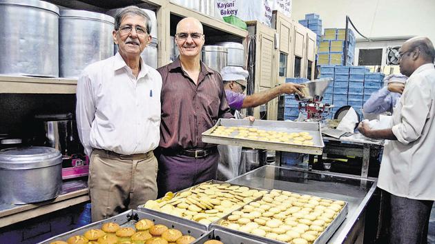 Rustom Kayani (R) and Sohrab Kayani (L) with products at Kayani Bakery on East street, Camp on December 4.(RAVINDRA JOSHI/HT PHOTO) Rustom Kayani (R) and Sohrab Kayani (L) with products at Kayani Bakery on East street, Camp on December 4.(RAVINDRA JOSHI/HT PHOTO)
