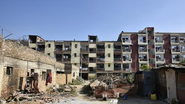 Over 150 families owning flats in the colony are caught in a bind as the legal status of the gated society in the middle-class neighbourhood near Heritage school in Vasant Kunj remains uncertain.(Sanchit Khanna/HT Photo)