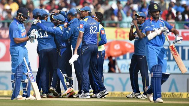 Sri Lanka's Angelo Mathews celebrates the wicket of India's Shikhar Dhawan during the first ODI match in Dharamshala. India recorded the lowest first powerplay score in ODI history.(PTI)