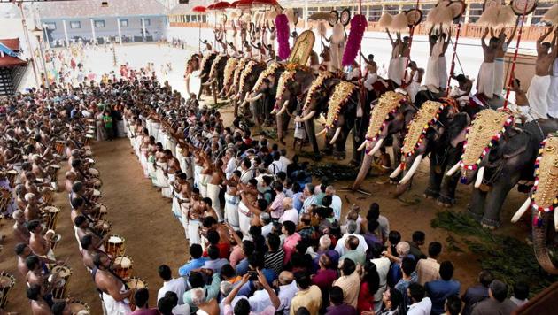 Priests and devotees perform Sheeveli rituals of 15 caparisoned elephants at the Thripoonithuta Sree Poornathrayeesa Temple in Kochi, Kerala. (PTI File Photo/Representative image)