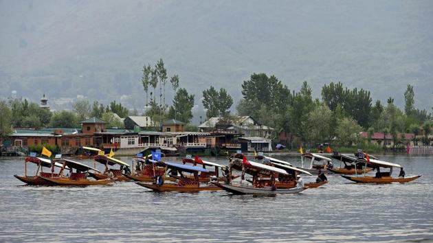 Boatmen row their boats during Shikara Festival at Dal Lake in Srinagar. (PTI File Photo) Boatmen row their boats during Shikara Festival at Dal Lake in Srinagar. (PTI File Photo)