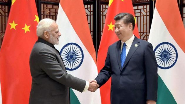 Prime Minister Narendra Modi meets Chinese president Xi Jinping on the sidelines of the 9th BRICS Summit in Xiamen, China, on Tuesday.(PTI Photo)