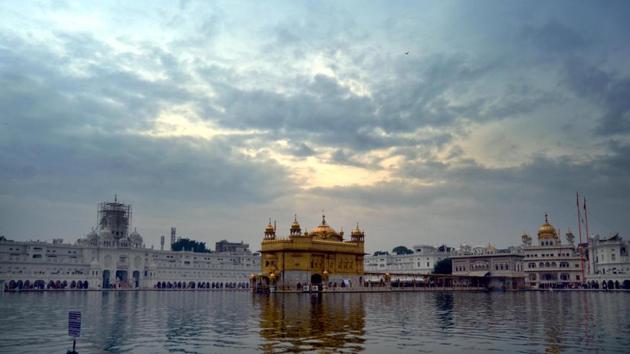 Clouds loom over the Golden Temple in Amritsar on Monday. (sameer sehgal/ht) Clouds loom over the Golden Temple in Amritsar on Monday. (sameer sehgal/ht)