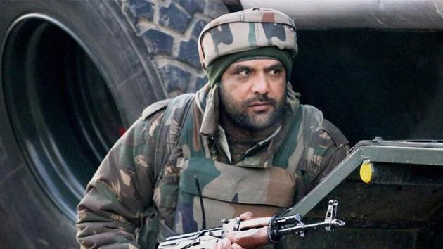 A soldier takes position during a recent encounter between militants and security forces in north Kashmir's Sopore town. (PTI File) A soldier takes position during a recent encounter between militants and security forces in north Kashmir's Sopore town. (PTI File)