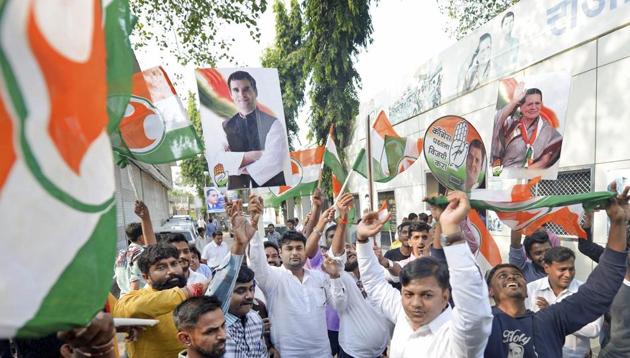 Congress party workers celebrate after Rahul Gandhi was declared the party president-elect, in Mumbai on Monday. (PTI) Congress party workers celebrate after Rahul Gandhi was declared the party president-elect, in Mumbai on Monday. (PTI)