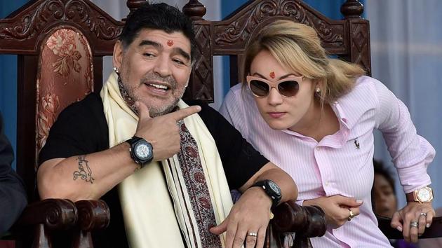 Former Argentine footballer Diego Maradona with his wife after being felicitated at a programme in Kolkata on Monday. (PTI)