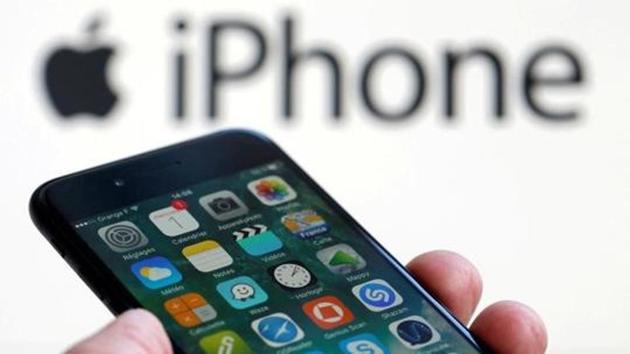 An Apple iPhone 7 and the company logo are seen in this illustration picture taken in Bordeaux, France. (Reuters)