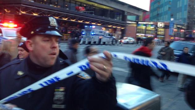 Police respond to a report of an explosion near Times Square on Monday.(AP) Police respond to a report of an explosion near Times Square on Monday.(AP)
