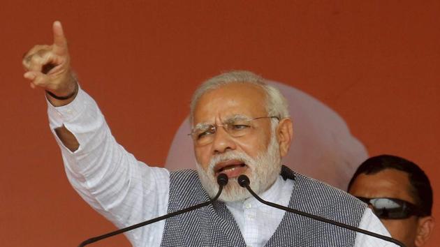 Prime Minister Narendra Modi addresses an election campaign rally in Sanand on Sunday.(PTI)
